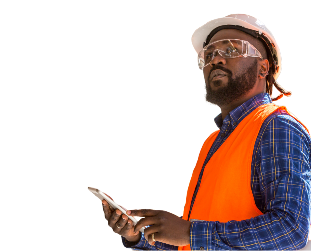 A construction worker holding a tablet